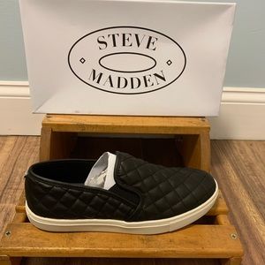 Steve Madden black slip-on’s